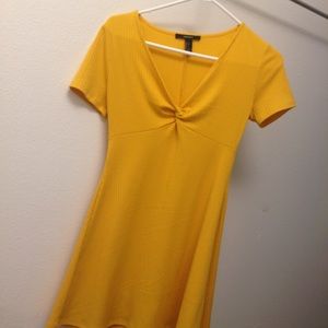 A yellow  skater dress